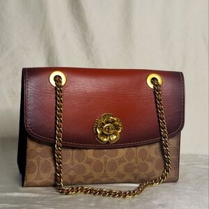 Coach Purse with metalic flower details